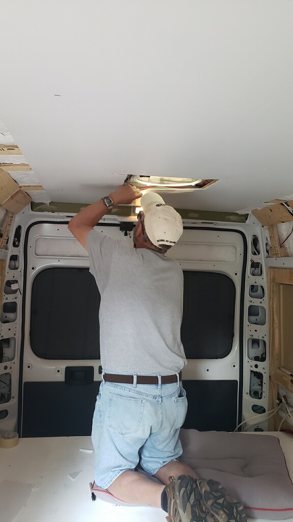 Photo of Gravytrain's roof with two fans installed.